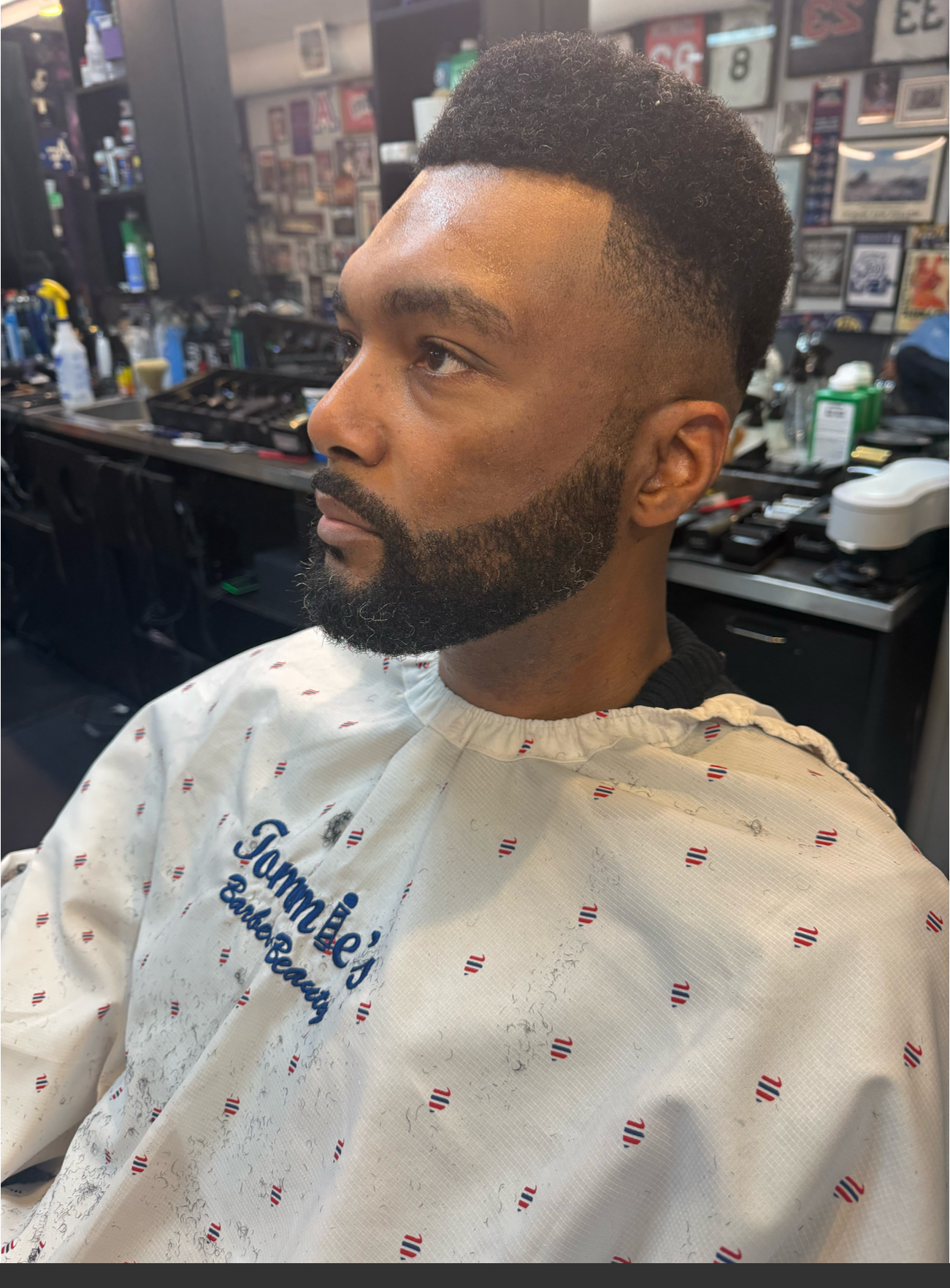 Clean fade and beard trim at Tommie's Barber-Beauty