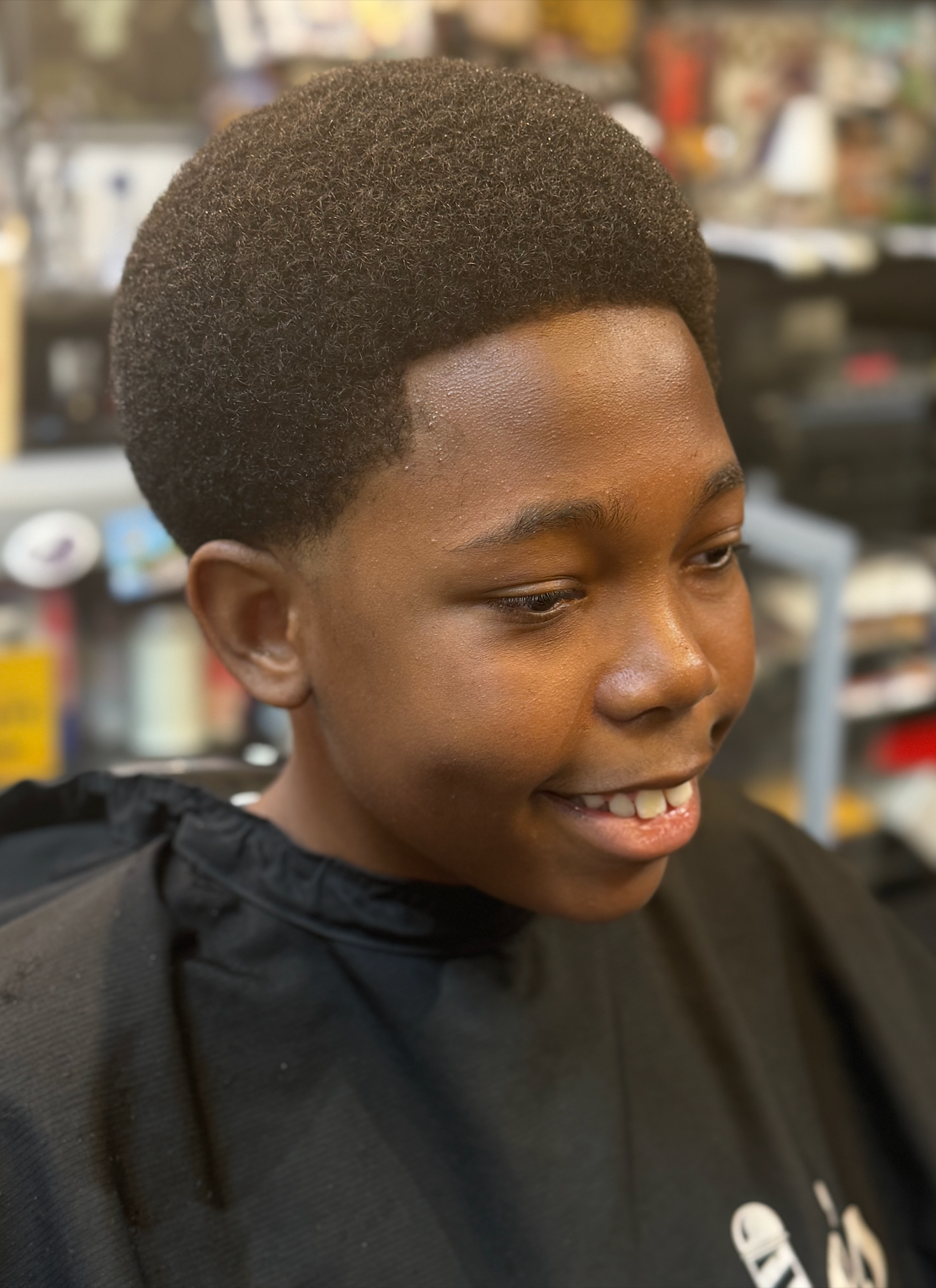 Kid's temp fade haircut at Tommie's Barber-Beauty
